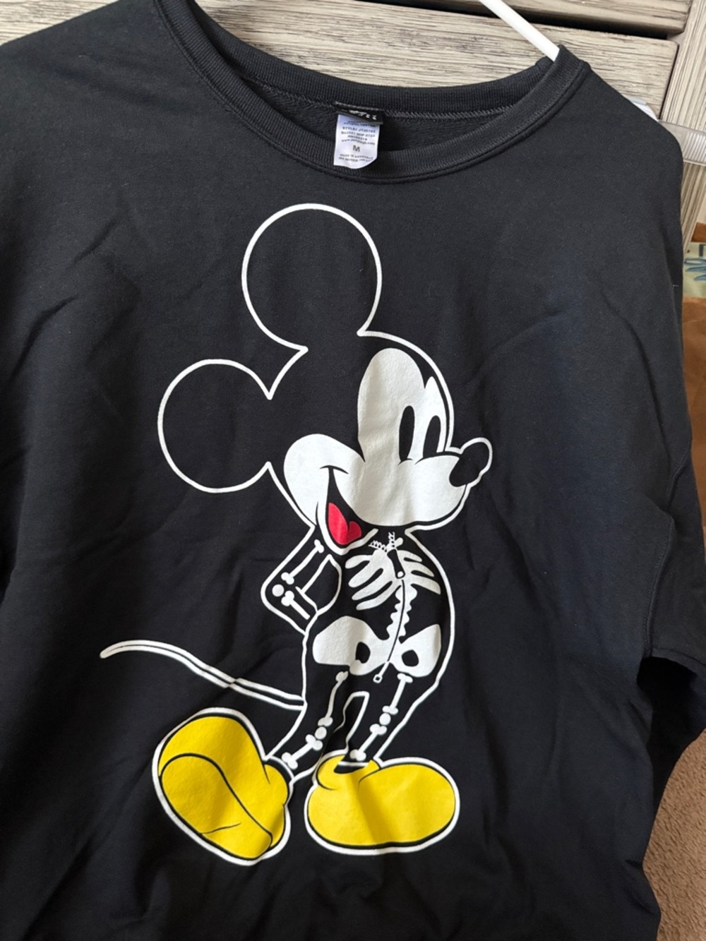 Disney Mickey Mouse ladies Halloween graphic sweatshirt with Yellow Shoe Detail